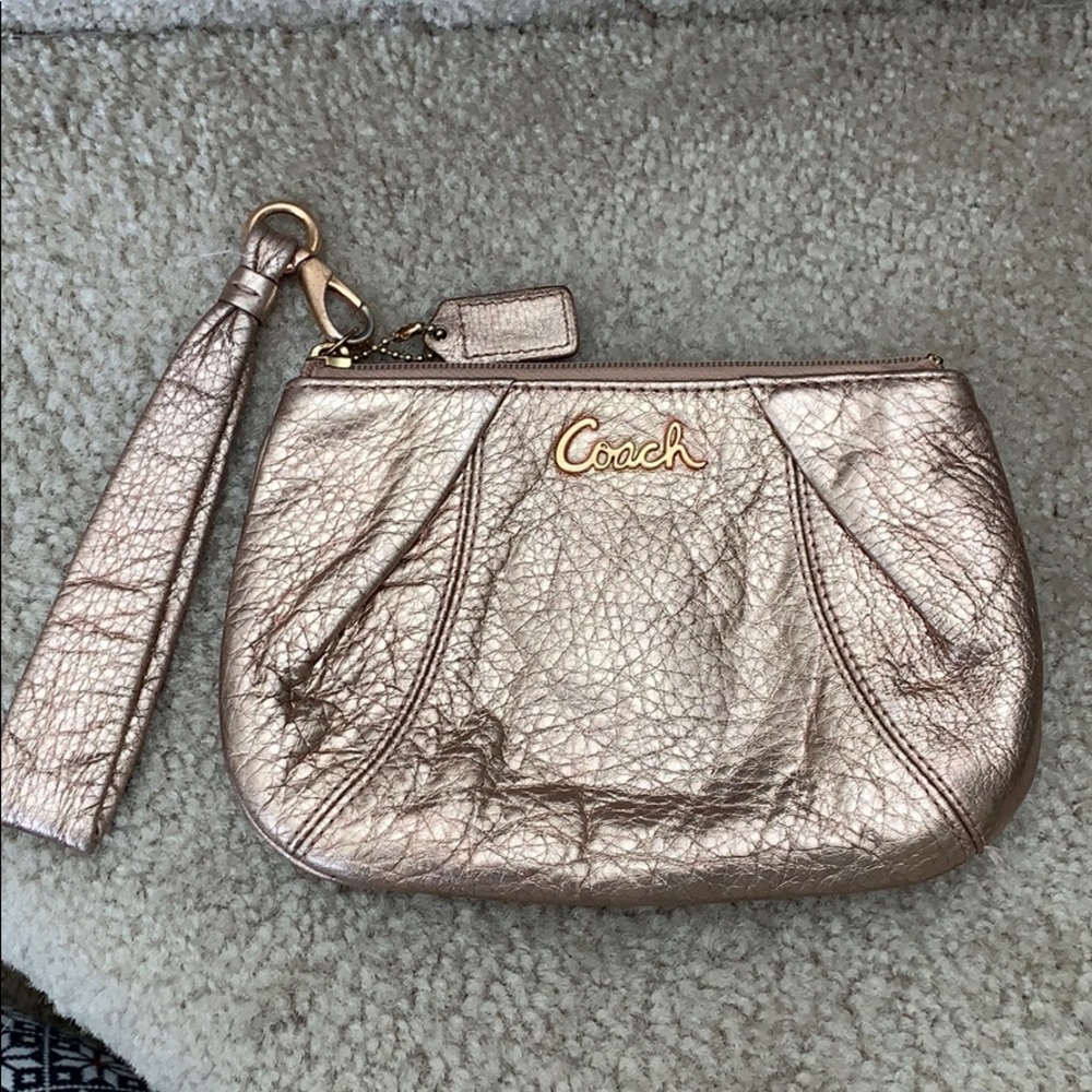 Rose gold Coach Wristlet